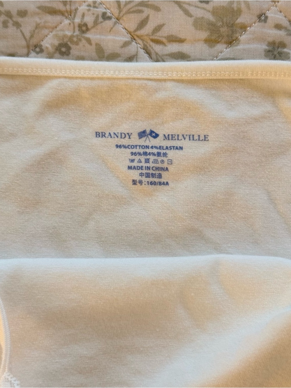 Brandy Melville white lace cami top with button details - Picture 6 of 6